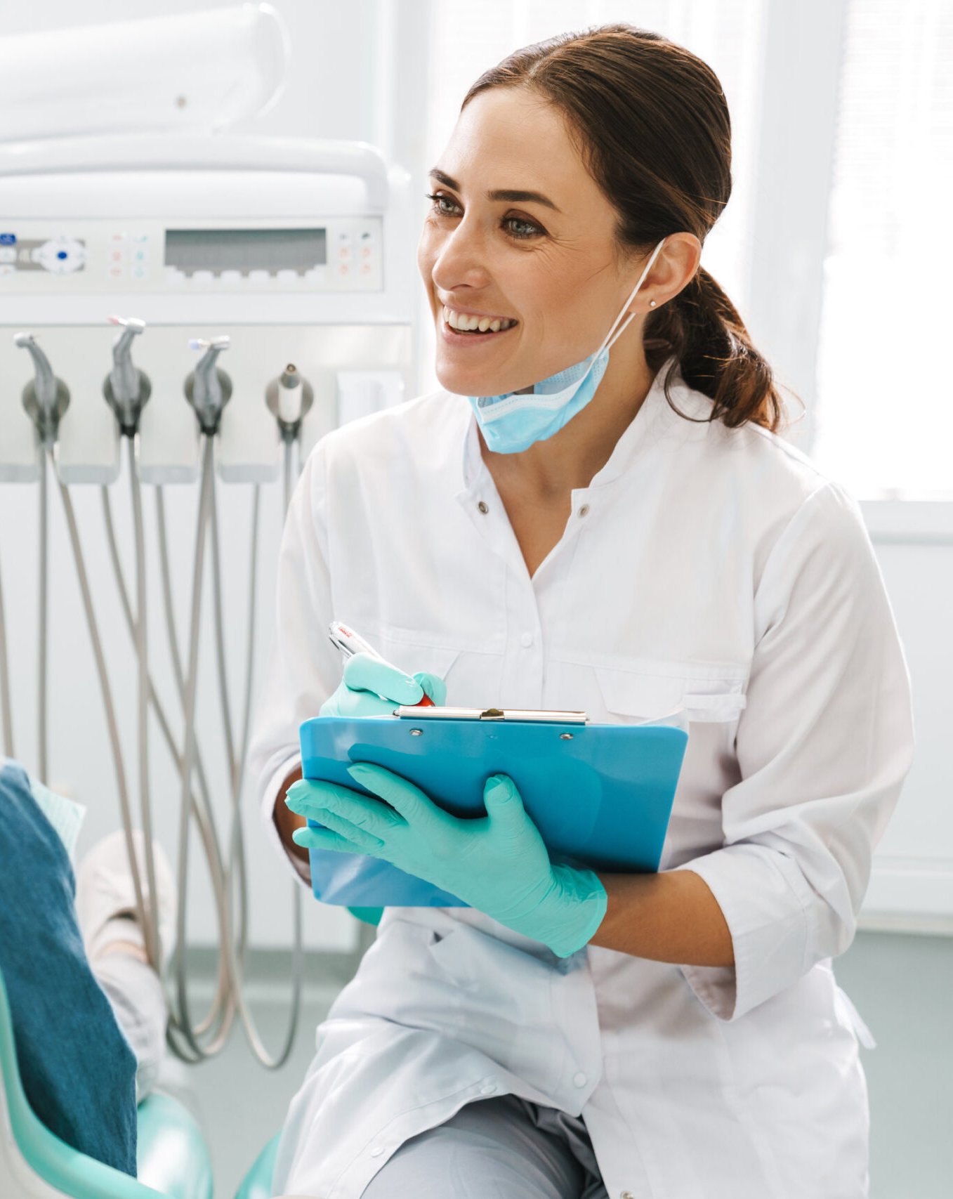 Dr. Khezri consulting with a patient at Revive Dentistry near Deltona, FL