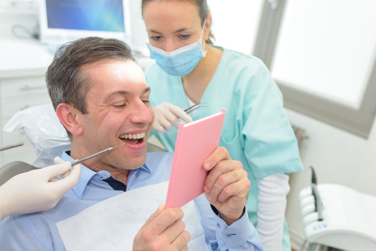 Man smiling at dental check-up