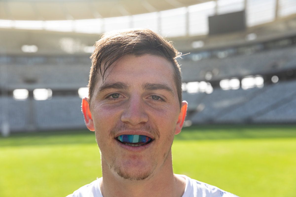 Athlete with mouthguard on field