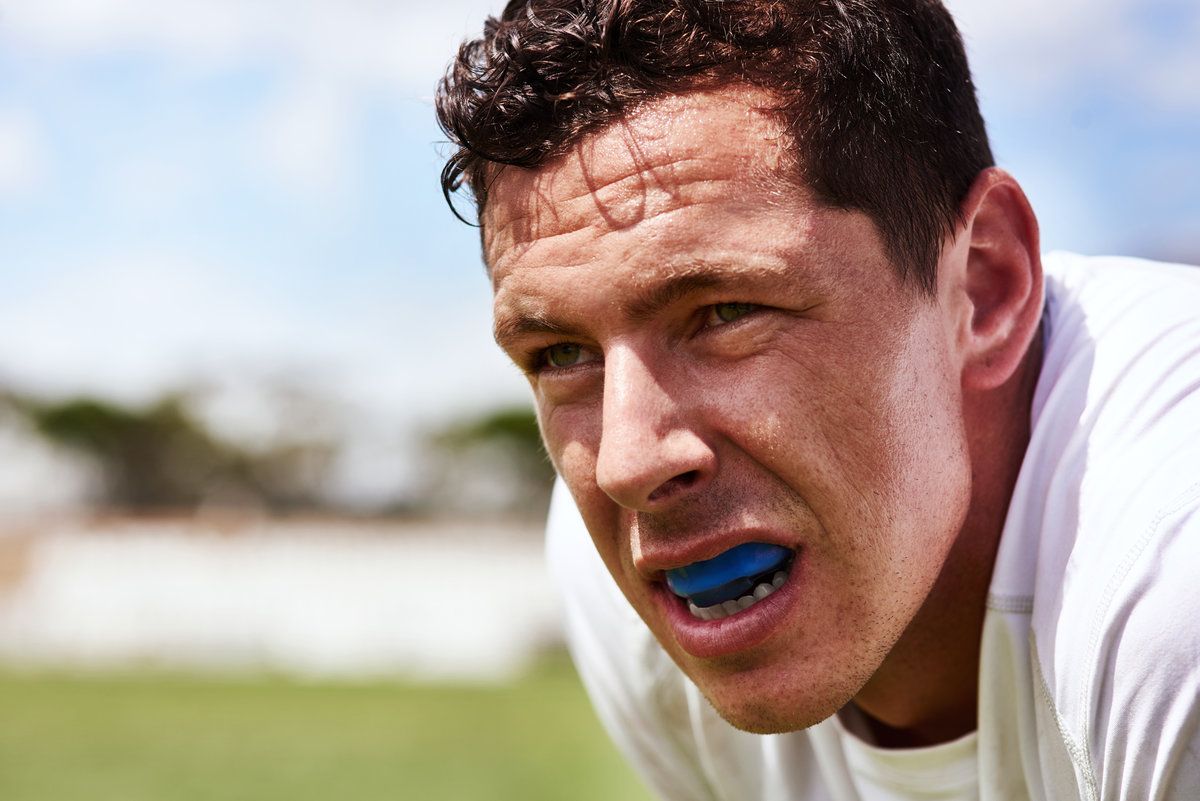 Athlete wearing mouthguard, focused expression