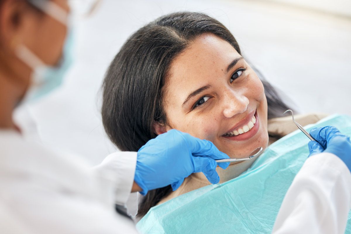 Patient smiling during dental check-up